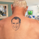 Illustration for article titled ‘Follow Your Instructions, This Is All Part Of The Plan,’ Hisses Richard Nixon Tattoo Protruding From Roger Stone’s Back
